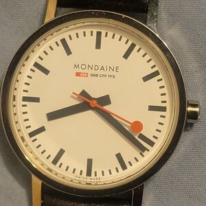 Mondaine Black and White Watch with Red Accent